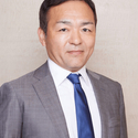Portrait of Ryosuke Takai, leadership advisor at Russell Reynolds Associates