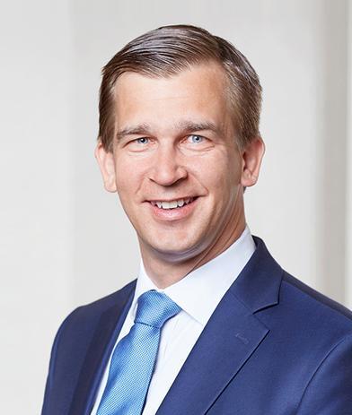 Portrait of Claus Fischer, leadership advisor at Russell Reynolds Associates