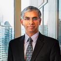 Portrait of Gautham Parthasarathy, leadership advisor at Russell Reynolds Associates