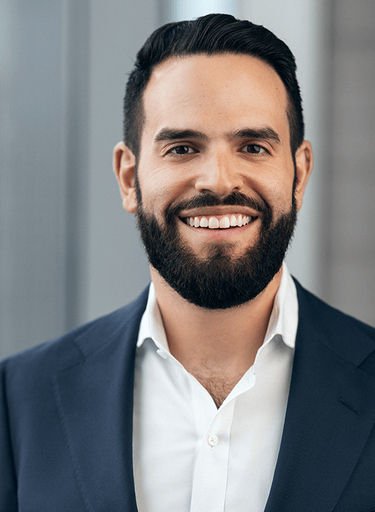 Portrait of Sam Smith, leadership advisor at Russell Reynolds Associates