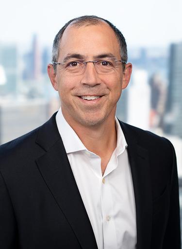 Portrait of Justin Cerilli, leadership advisor at Russell Reynolds Associates