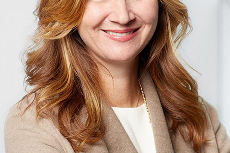 Portrait of Caitlin MacNamara, leadership advisor at Russell Reynolds Associates