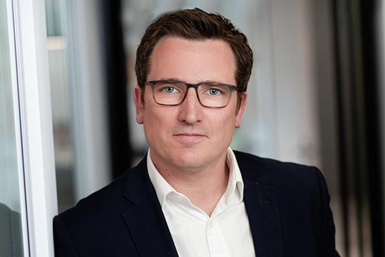 Portrait of Andrew White, leadership advisor at Russell Reynolds Associates