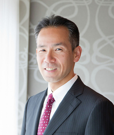 Portrait of Tsutomu Mito, leadership advisor at Russell Reynolds Associates
