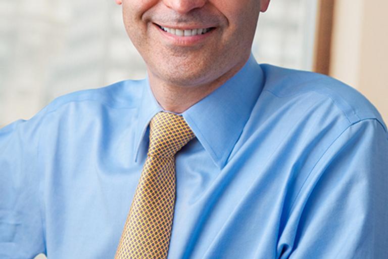 Portrait of Bennett Hanig, PhD, leadership advisor at Russell Reynolds Associates