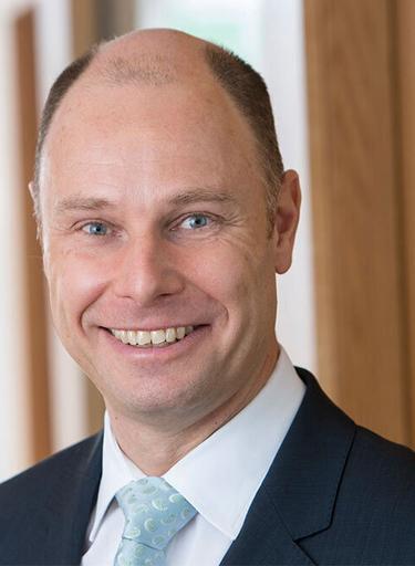 Portrait of Jonas Augustson, leadership advisor at Russell Reynolds Associates