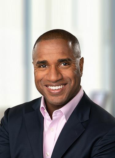 Portrait of Bradlee Benn, leadership advisor at Russell Reynolds Associates