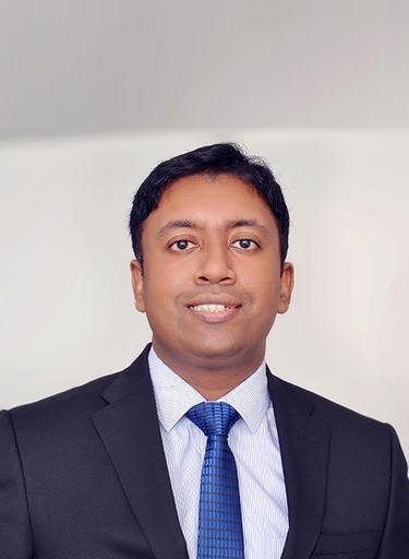 Portrait of Vijuraj Eranazhath, leadership advisor at Russell Reynolds Associates