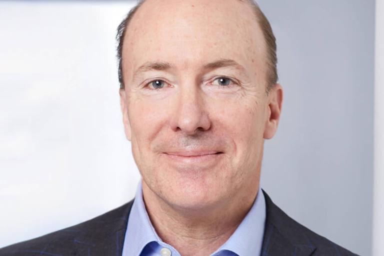 Portrait of Clarke Murphy, CEO emeritus, leadership advisor at Russell Reynolds Associates