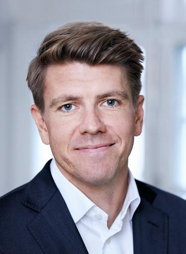 Portrait of Mads Wilhelmsen, leadership advisor at Russell Reynolds Associates