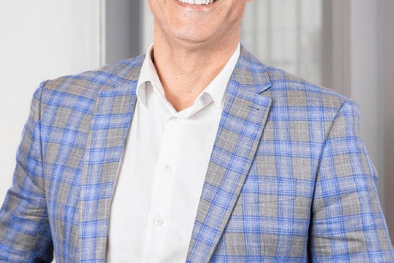 Portrait of Fernando Machado, leadership advisor at Russell Reynolds Associates