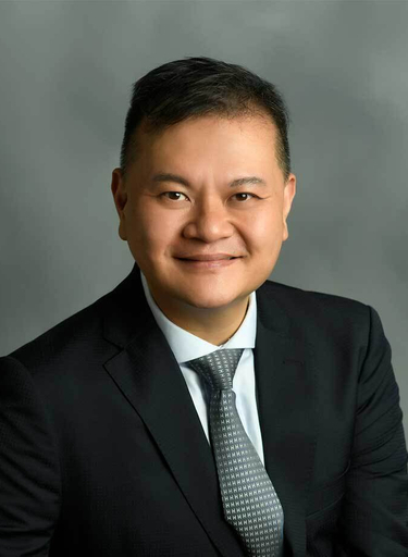 Portrait of Harry Lin, leadership advisor at Russell Reynolds Associates