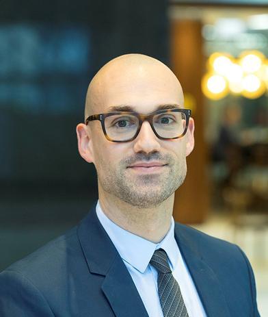 Portrait of Spencer Covey, leadership advisor at Russell Reynolds Associates