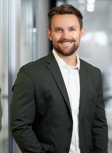 Portrait of Sam Horton, leadership advisor at Russell Reynolds Associates