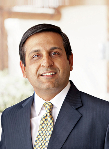 Portrait of Puneet Kalra, leadership advisor at Russell Reynolds Associates