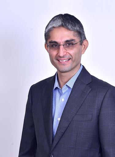 Portrait of Harpuneet Singh, leadership advisor at Russell Reynolds Associates
