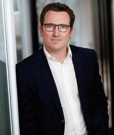 Portrait of Andrew White, leadership advisor at Russell Reynolds Associates
