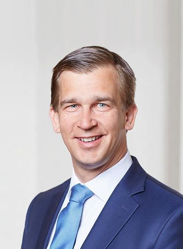 Portrait of Claus Fischer, leadership advisor at Russell Reynolds Associates