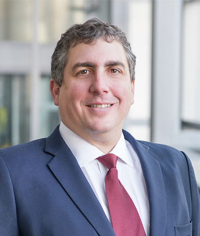 Portrait of Alain Ishak, leadership advisor at Russell Reynolds Associates