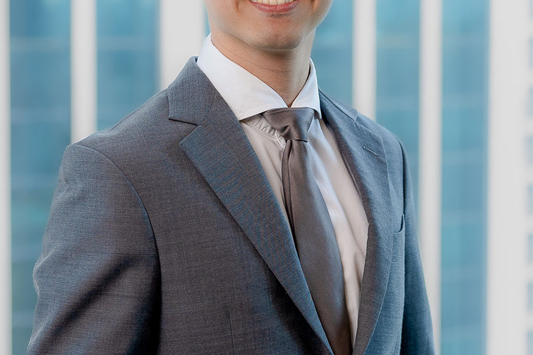 Portrait of Derek Poh, leadership advisor at Russell Reynolds Associates