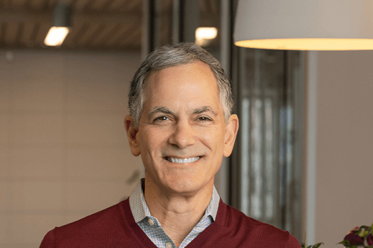 Portrait of Dean Stamoulis, leadership advisor at Russell Reynolds Associates