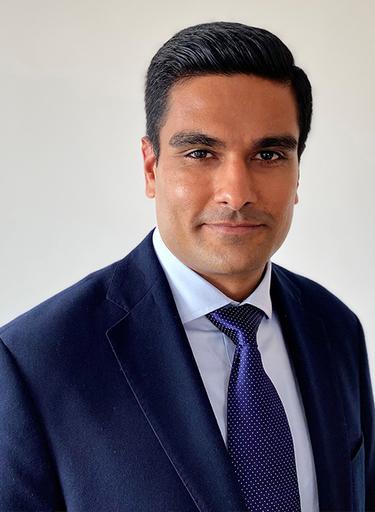 Portrait of Kunal Sharma, leadership advisor at Russell Reynolds Associates