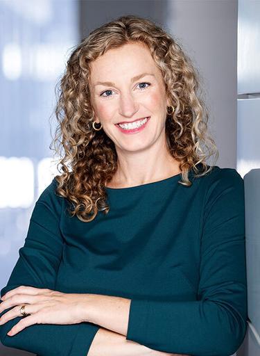 Portrait of Emmy Melville, leadership advisor at Russell Reynolds Associates