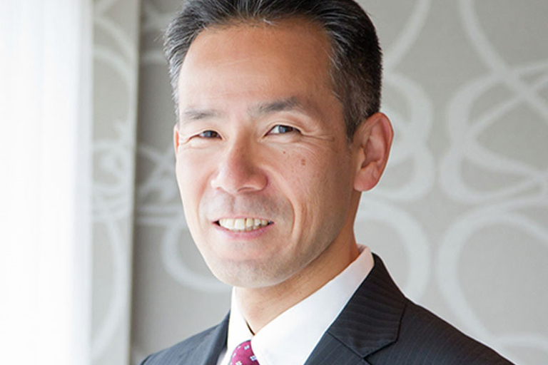Portrait of Tsutomu Mito, leadership advisor at Russell Reynolds Associates