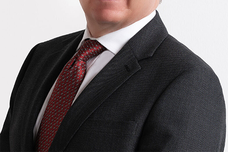 Portrait of Simon Fletcher, leadership advisor at Russell Reynolds Associates