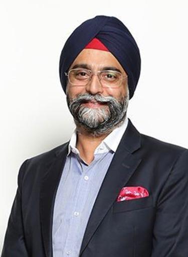 Portrait of Gurprriet Siingh, leadership advisor at Russell Reynolds Associates