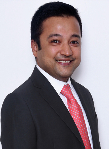 Portrait of Dhruv Shah, leadership advisor at Russell Reynolds Associates