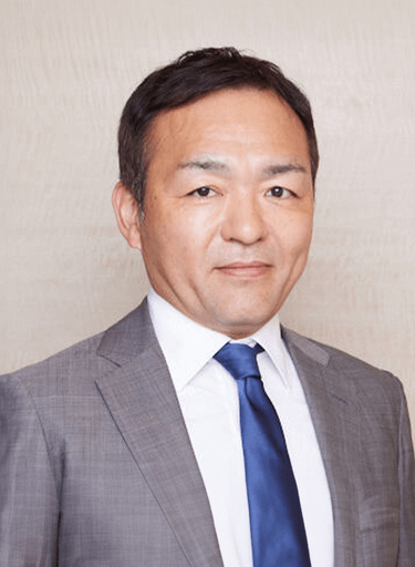 Portrait of Ryosuke Takai, leadership advisor at Russell Reynolds Associates