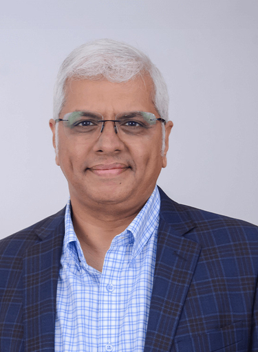 Portrait of Sachin Rajan, leadership advisor at Russell Reynolds Associates