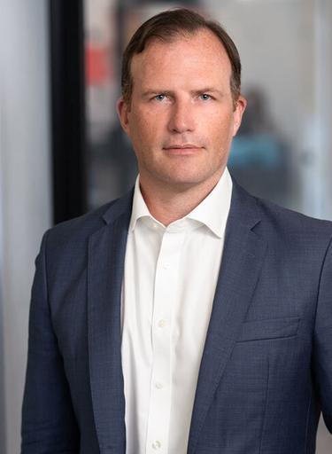 Portrait of Patrick Mooney, leadership advisor at Russell Reynolds Associates