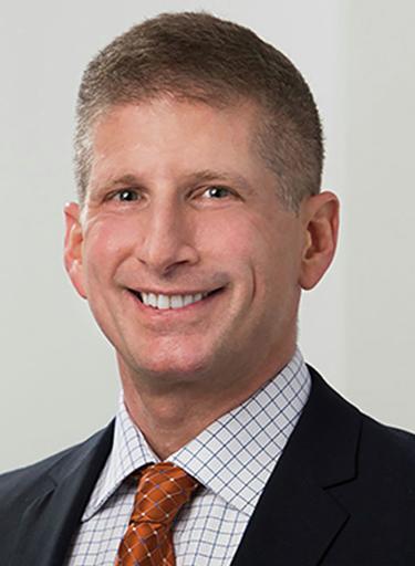 Portrait of Jett Pihakis, leadership advisor at Russell Reynolds Associates