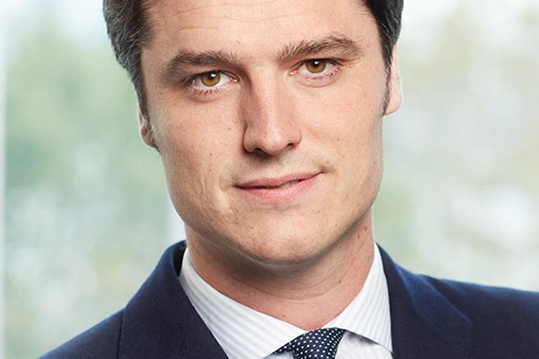 Portrait of Andres Gil-Casares, leadership advisor at Russell Reynolds Associates