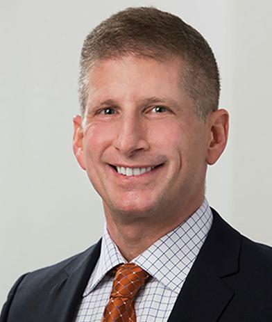 Portrait of Jett Pihakis, leadership advisor at Russell Reynolds Associates