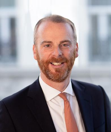 Portrait of Tom Hicks, leadership advisor at Russell Reynolds Associates