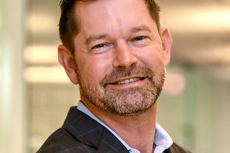 Portrait of Scott E. Smith, leadership advisor at Russell Reynolds Associates