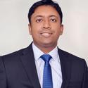 Portrait of Vijuraj Eranazhath, leadership advisor at Russell Reynolds Associates