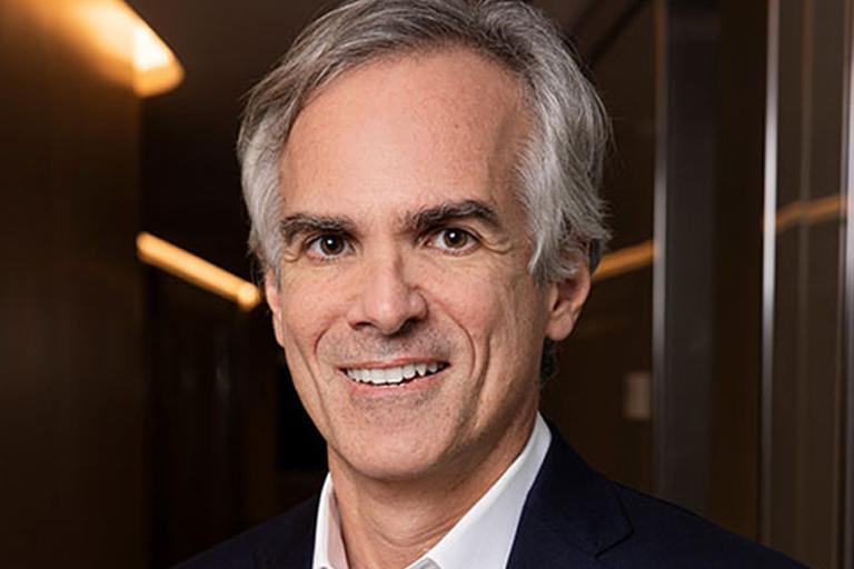 Portrait of Constantine Alexandrakis, CEO of Russell Reynolds Associates