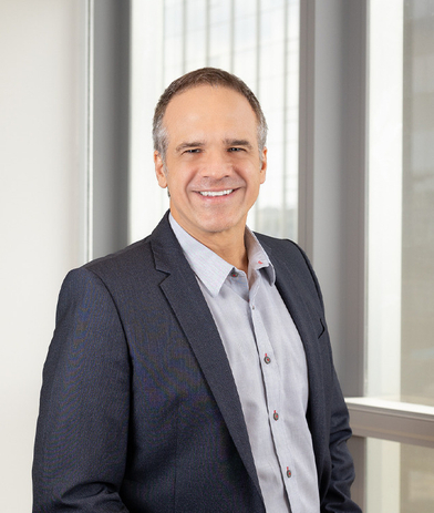 Portrait of Henrique Valente Carneiro, leadership advisor at Russell Reynolds Associates
