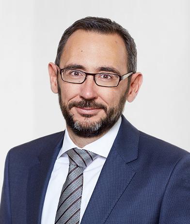 Portrait of Dominik Brülisauer, leadership advisor at Russell Reynolds Associates