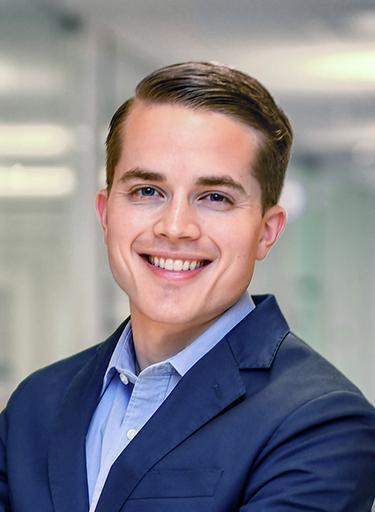 Portrait of Hunter Burke, leadership advisor at Russell Reynolds Associates
