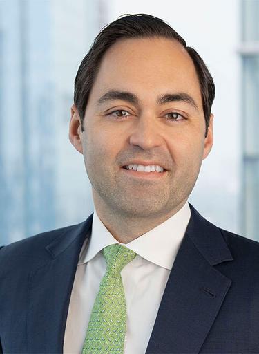 Portrait of John Madera, leadership advisor at Russell Reynolds Associates