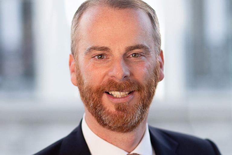 Portrait of Tom Hicks, leadership advisor at Russell Reynolds Associates