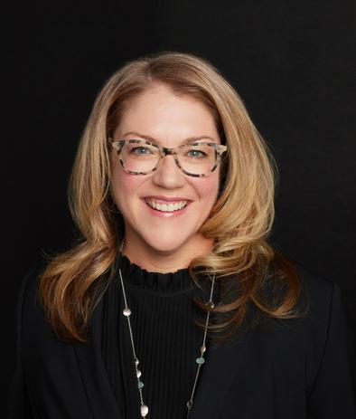 Portrait of Jina Abells Morissette, leadership advisor at Russell Reynolds Associates