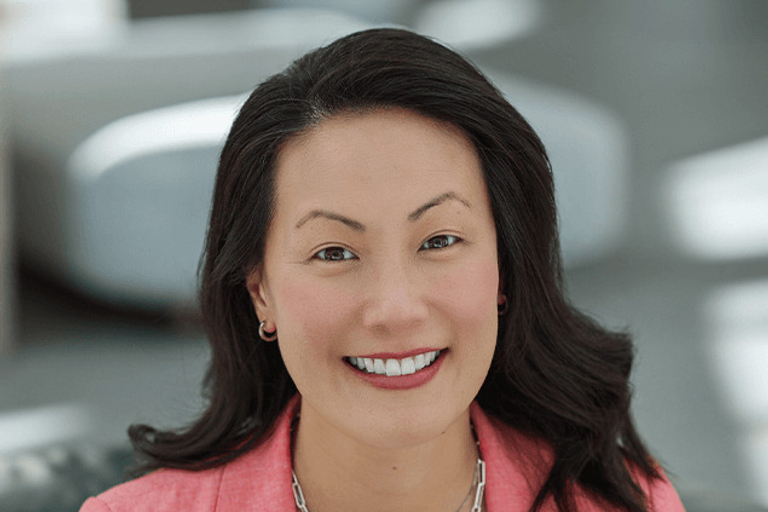 Portrait of Yvonne Lu, leadership advisor at Russell Reynolds Associates
