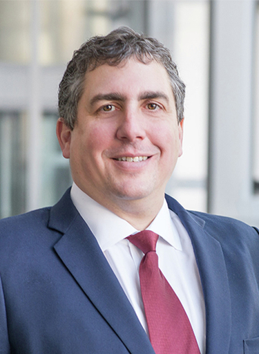 Portrait of Alain Ishak, leadership advisor at Russell Reynolds Associates