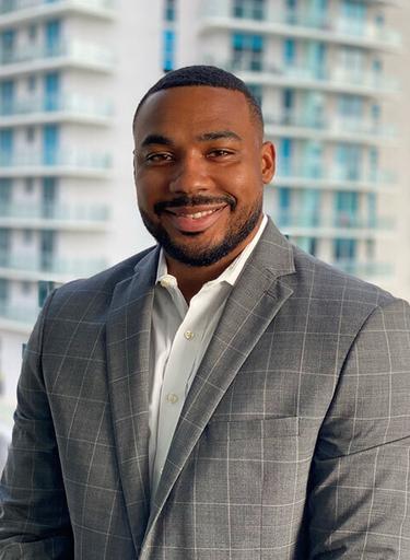 Portrait of Dion Nesmith, leadership advisor at Russell Reynolds Associates